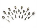 a lot of spoons and spoon spoons on a white surface