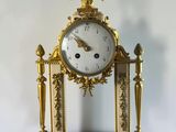 a clock that is sitting on top of a table