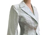 an image of a woman ' s white suit on a mannequin dummy