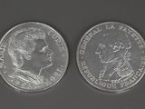 a close up of two quarters of the same coin