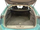a trunk of a car with the back door open