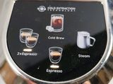 a close up of a coffee maker on a counter
