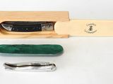 a knife and a knife sharper sitting on a table