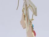 pair of gold plated earrings with multi colored stones on them