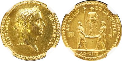 a close up of a gold coin with a man on it