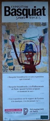 une affiche sur laquelle figure la photo d'un homme portant un chapeau