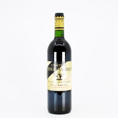a bottle of wine that is sitting on a table