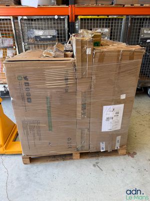 many boxes stacked on top of each other in a warehouse
