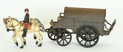 a figurine of a man riding on a horse drawn carriage