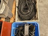 a person standing next to a box with wires in it