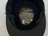 a black hat that is sitting on top of a table