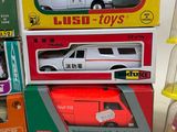 a lot of toy cars that are sitting on top of each other