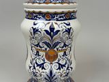 an image of a blue and white vase sitting on a table