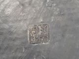 underside view of a silver plate with a chinese writing on it