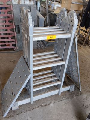 a metal ladder that is sitting in a garage