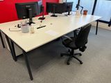 an image of a desk with two computer monitors on it