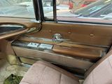 a brown car with a brown seat and a brown dashboard