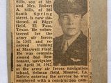 an old newspaper advertises a picture of a man in uniform