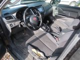 a picture of a car with a steering wheel and a dashboard