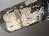 a close up of a piece of metal that has been scratched
