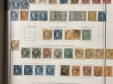 an image of a picture of a collection of stamps on a table