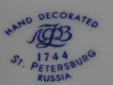 a close up of a plate with a flower on it