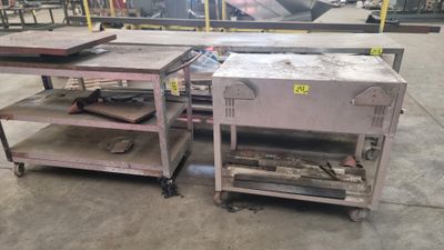 two carts that are sitting in a warehouse