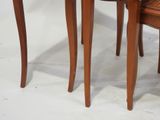 two wooden tables with a marble top on a white background