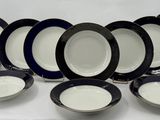 a lot of plates that are sitting on a table