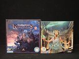two video games that are on display on a table