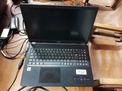 a laptop computer that is sitting on a table