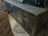 a microwave sitting on top of a counter in a kitchen