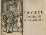 an old book with a picture of a man in a suit and a woman in a dress