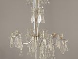 an image of a crystal chandelier hanging from a ceiling
