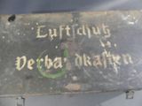 a sign that is on the side of a building