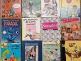 a lot of books that are sitting on a table