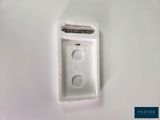 a picture of a small white device on a white surface