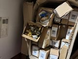 a pile of boxes that are sitting on the floor