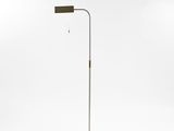 the floor lamp is made of metal and has a brown shade