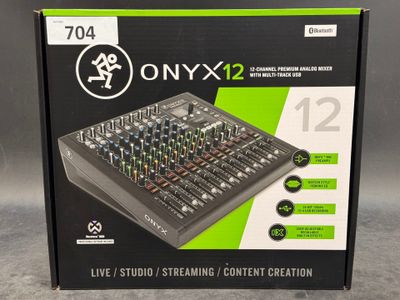 an image of a box of sound equipment for sale on a table