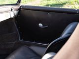 a view of the inside of a car from the driver ' s seat