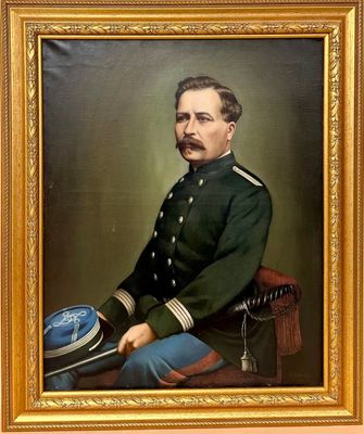 portrait of a man in a military uniform sitting in a chair