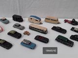 a lot of toy cars that are on a table