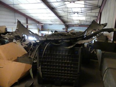 a large pile of junk inside of a building