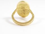 an image of a gold ring with a gold disc in the middle