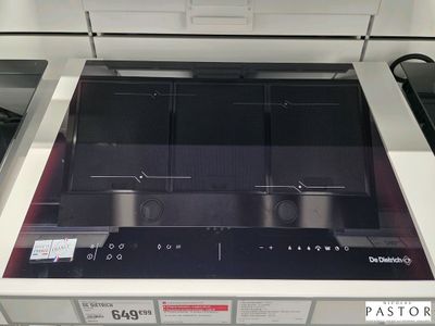 une cuisinière noire avec un brûleur noir dessus