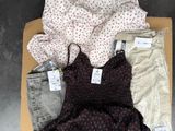the contents of a box are laid out on the floor