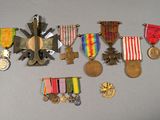 many medals and medals displayed on a table