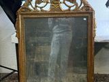 a mirror that is sitting on a table