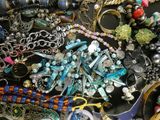 many different types of jewelry on the table together